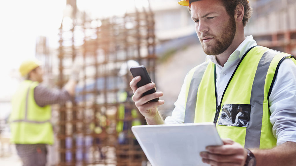 Using job management software on construction site